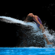 Illustration for article titled Photographs Of People At The Moment They Fly Out Of A Water Slide